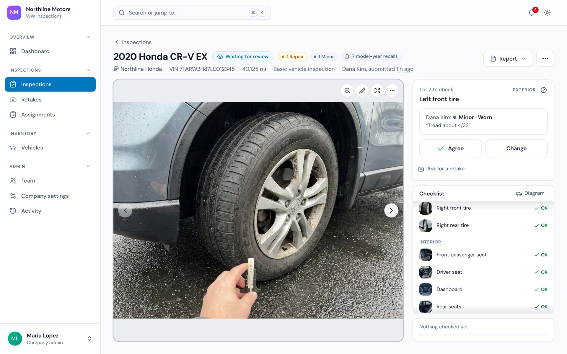 The web admin's review: a tire's photo, the inspector's finding, Agree or Change
