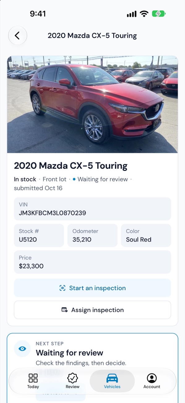 A vehicle's page: photo, VIN, stock number, odometer and its next step
